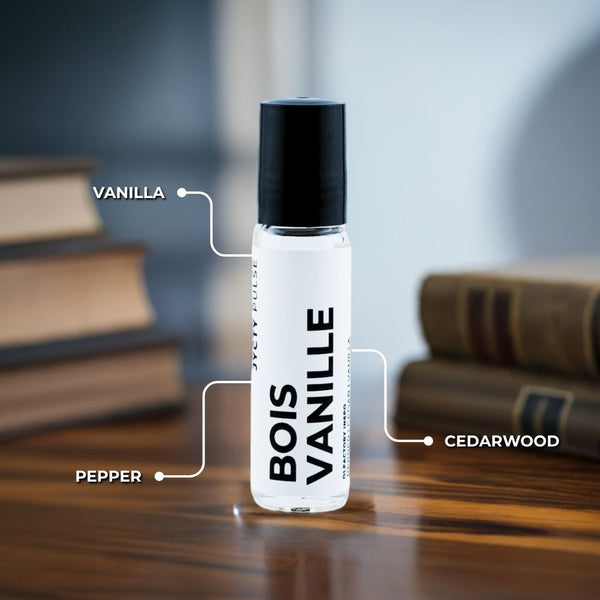 Bottle of Bois Vanille with labeled ingredients on a wooden surface