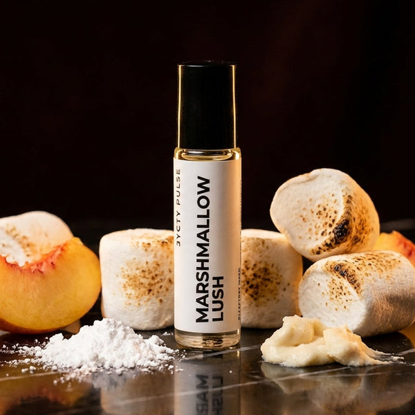 Marshmallow Lush perfume oil with marshmallows and peaches on a dark surface