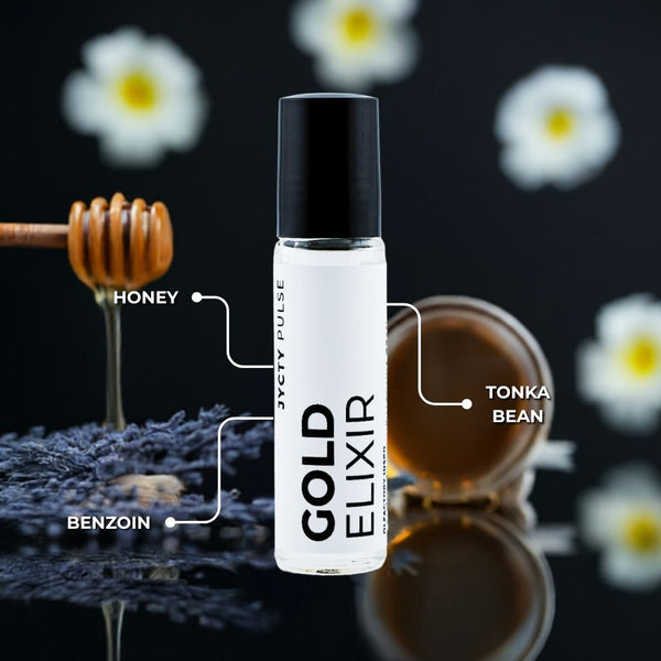 Gold Elixir bottle with honey, tonka bean, and benzoin elements on a dark background with flowers.