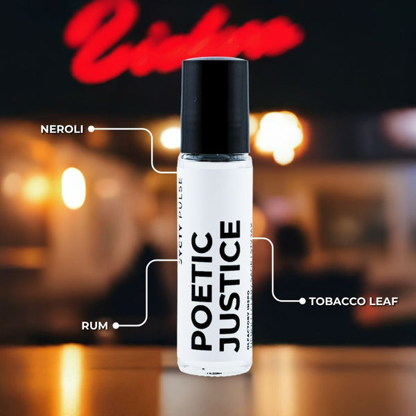 Roll-on bottle labeled 'Poetic Justice' with ingredients on a blurred bar background