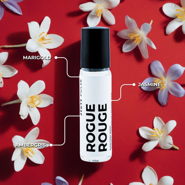 Skyy Vodka bottle labeled 'Rogue Rouge' with marigold, jasmine, and ambergris names on a red background with flowers.
