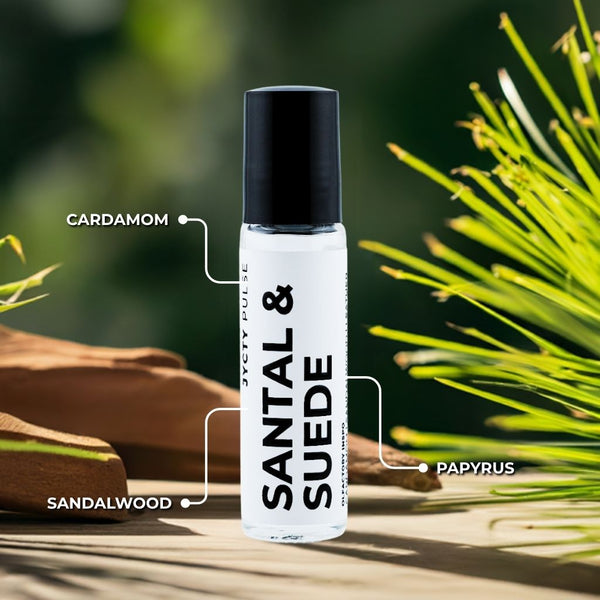 Roll-on bottle labeled 'Santal & Suede' with botanical elements on a wooden surface.