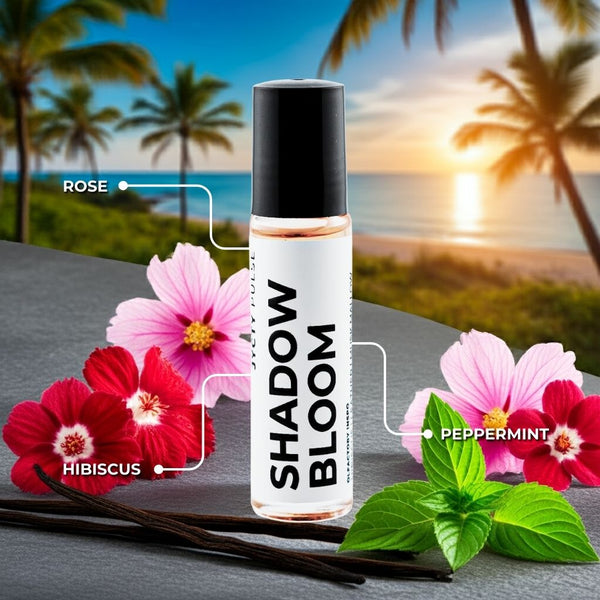 Shadow Bloom perfume bottle with flowers and vanilla bean against a tropical sunset background