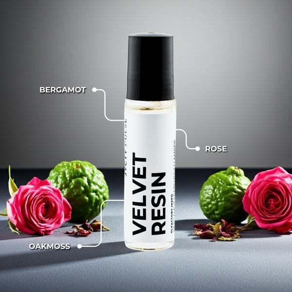 Roll-on bottle labeled 'Velvet Resin' with flowers and green fruit on a gray background
